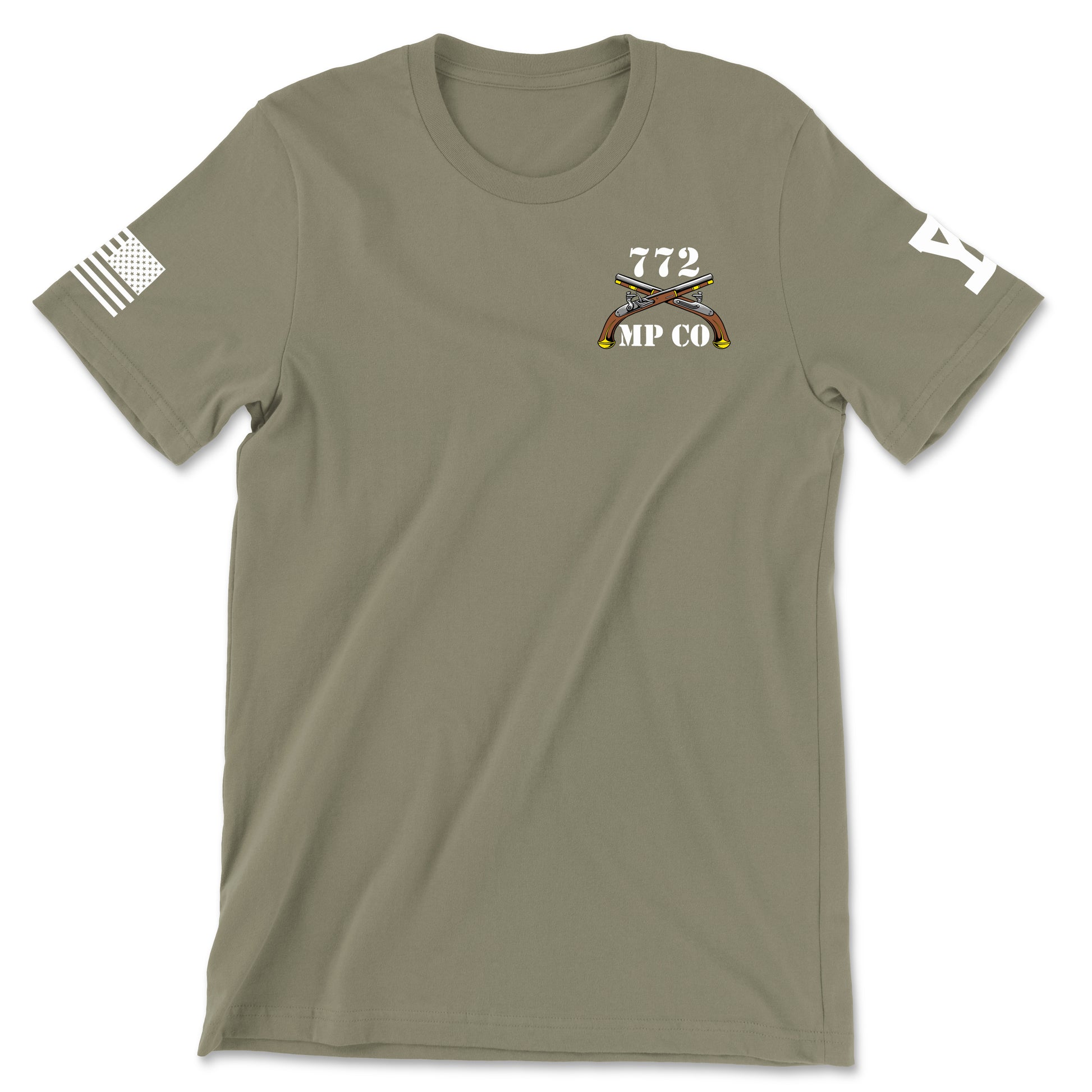 Front view of a coyote brown t-shirt for the 772nd Military Police Company. The left chest features a white graphic with the number '772' above a blue infantry disc and crossed flintlock pistols, with 'MP CO' written at the bottom. A white American flag patch is displayed on the right sleeve