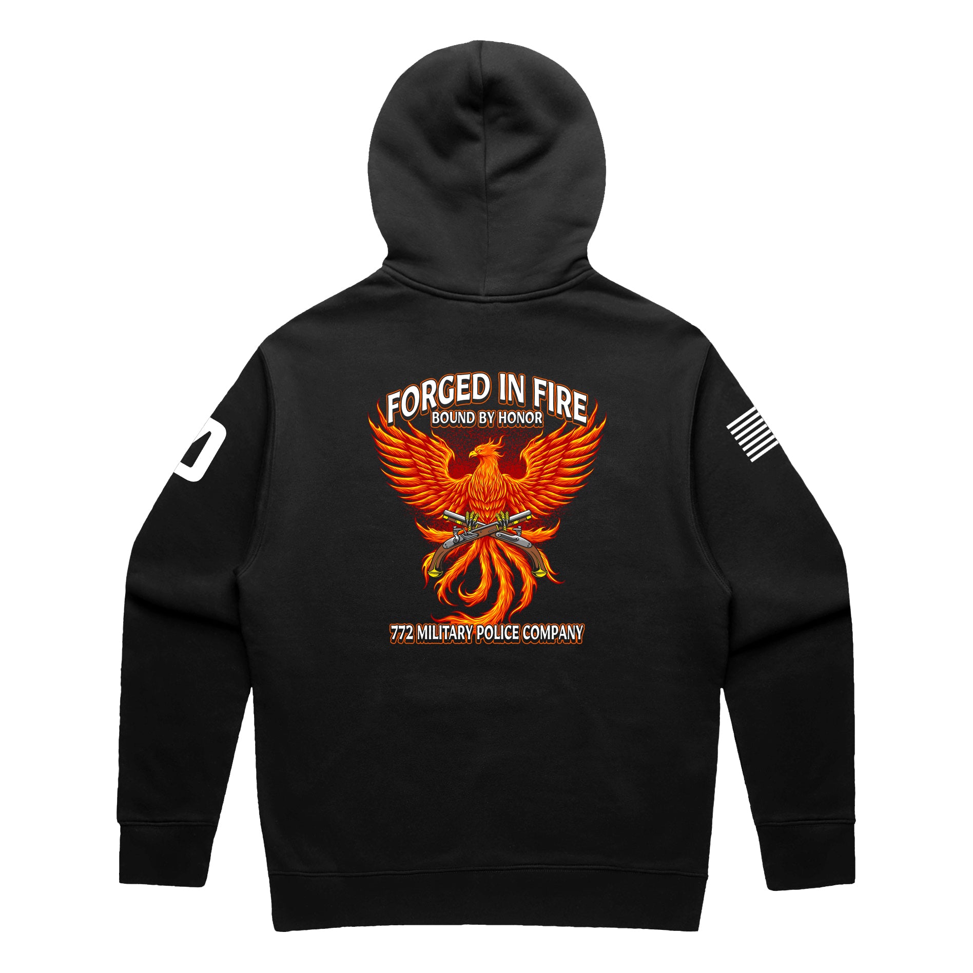 Back view of a black pullover hoodie for the 772nd Military Police Company. The design features a large orange and yellow phoenix rising from flames, with crossed flintlock pistols and a blue infantry disc at its center. Banners above read 'FORGED IN FIRE' and 'BOUND BY HONOR,' with '772 MILITARY POLICE COMPANY' written in red at the bottom. A white American flag patch is on the right sleeve.