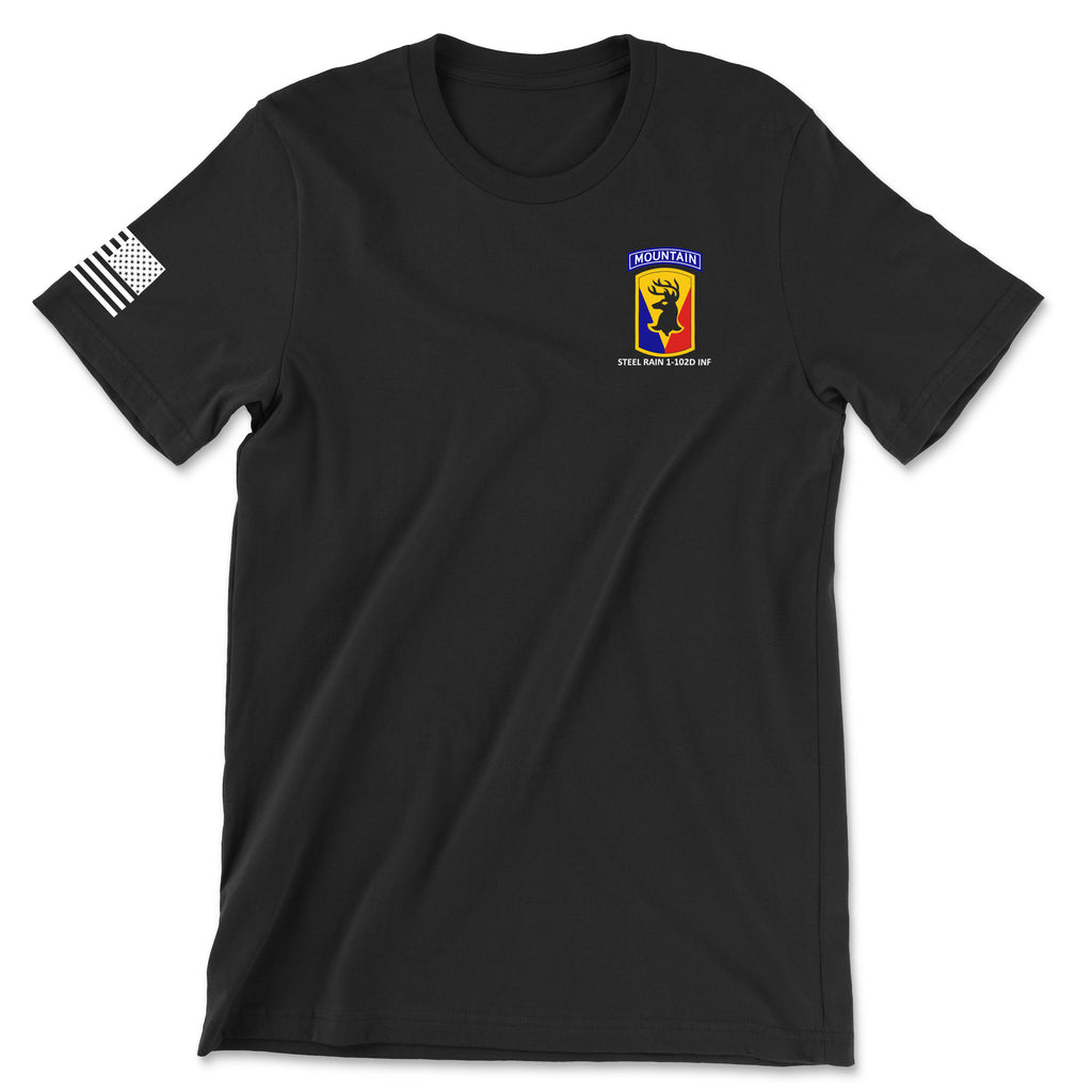 Front view of a black t-shirt for the 1st Battalion, 102nd Infantry Regiment (1-102D INF). The left chest features a yellow unit crest with a red stag silhouette and a 'MOUNTAIN' tab above it. The text 'STEEL RAIN 1-102D INF' is printed below the insignia. A white American flag patch is displayed on the right sleeve.